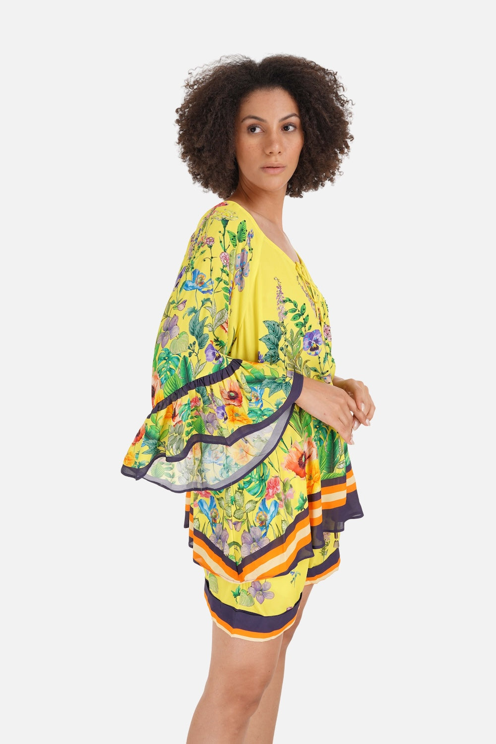 Side view of the yellow, green and black Calico Gypsy Tunic (TheSwankStore) Viscose Crepe fabric