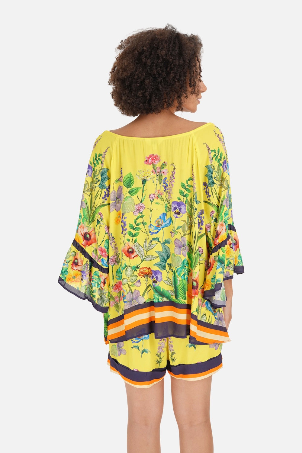 Back view of the yellow, green and black Calico Gypsy Tunic (TheSwankStore) Viscose Crepe fabric