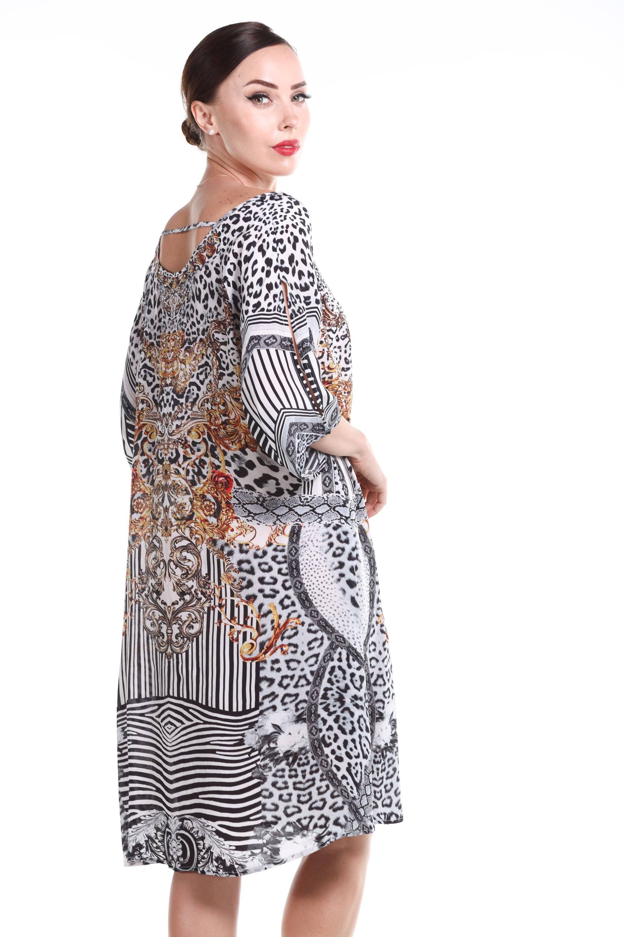 Side view of the Black, White & Orange Zaffari Slit Sleeve Dress (TheSwankStore) Soft Viscose fabric